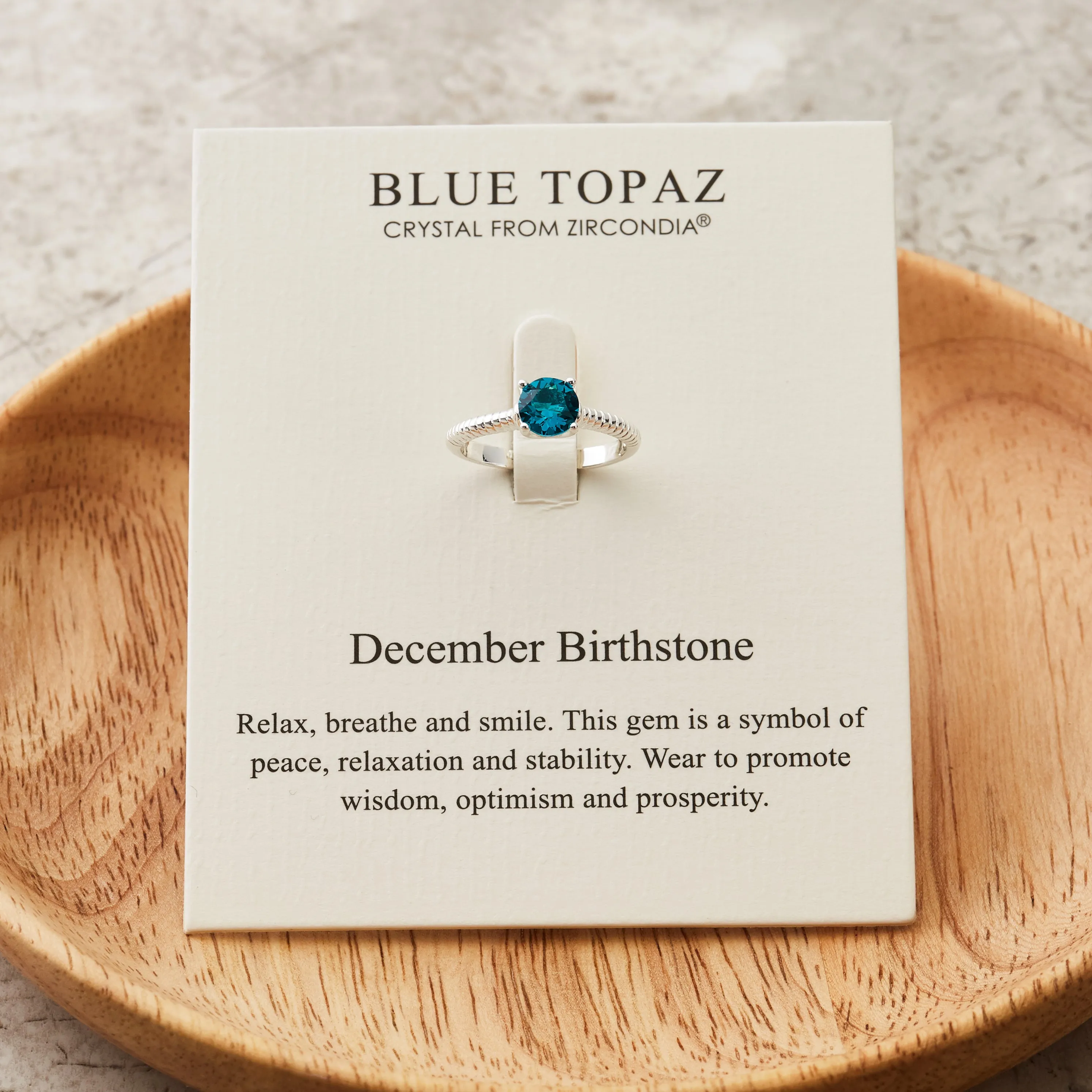 December (Blue Topaz) Adjustable Birthstone Ring Created with Zircondia® Crystals