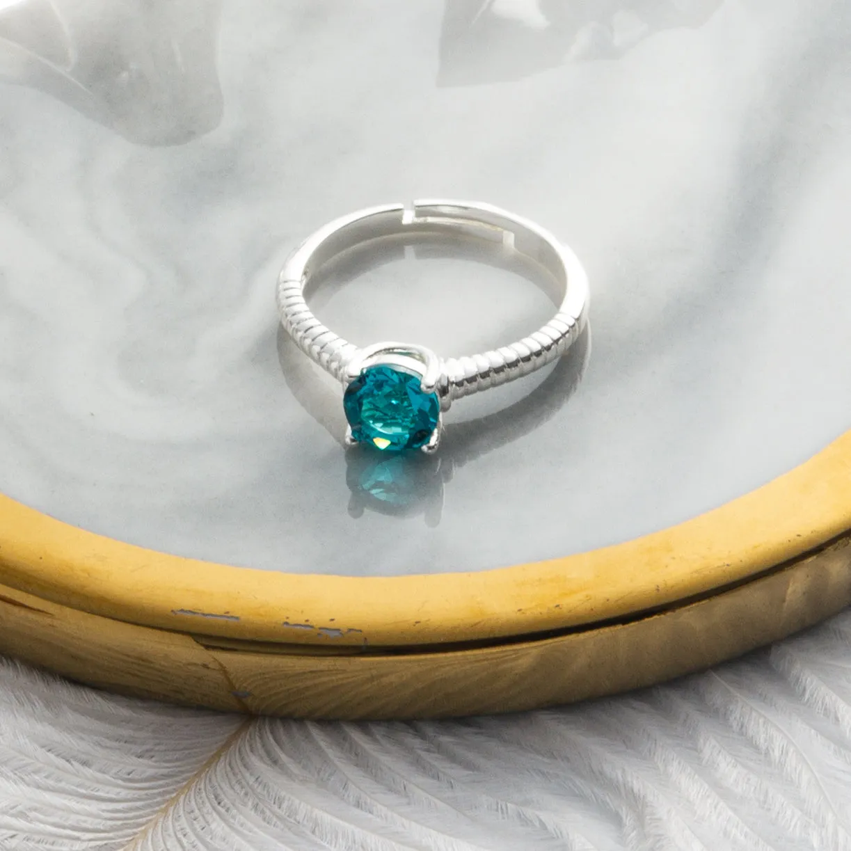 December (Blue Topaz) Adjustable Birthstone Ring Created with Zircondia® Crystals